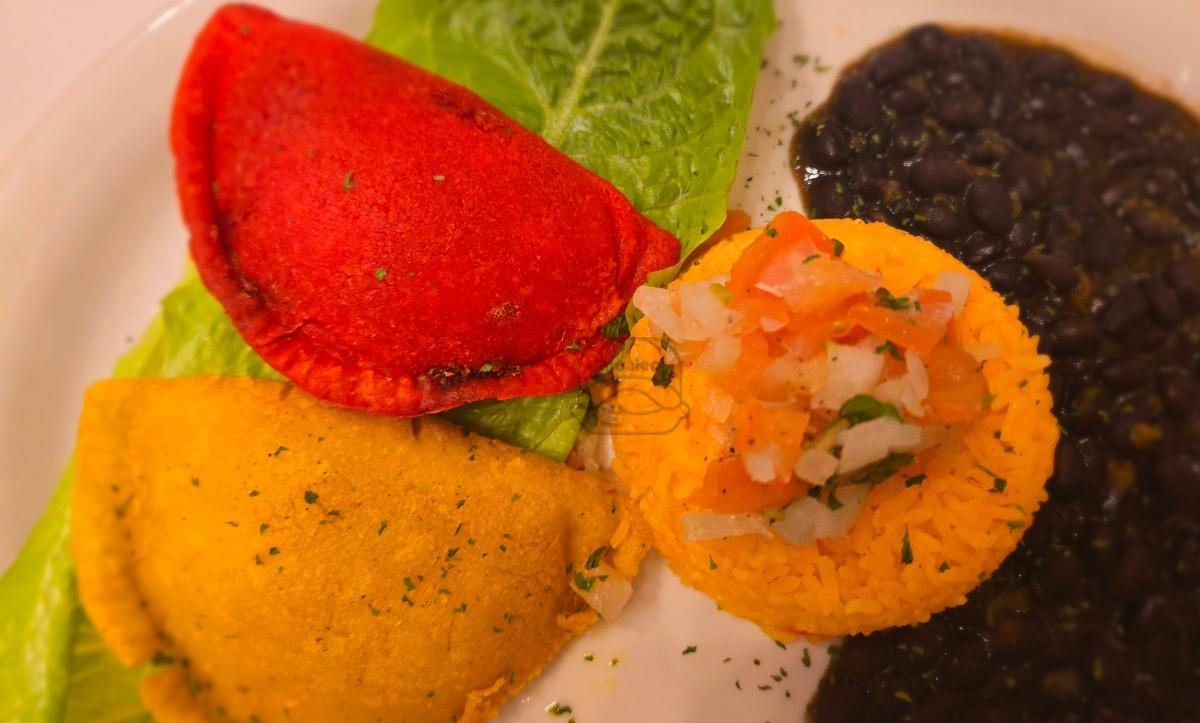 Your choice of any 2 handcrafted empanadas, yellow rice & beans.